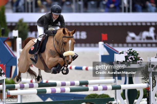 Alexandra Paillot of France on Tonio La Goutelle competes during the Saut Hermes at Le Grand Palais on March 17, 2018 in Paris, France.