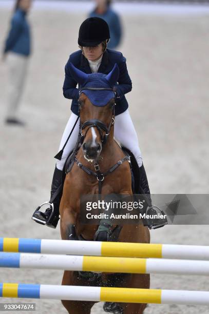 Edwina Tops Alexander of Australia on Lintea Tequila competes during the Saut Hermes at Le Grand Palais on March 17, 2018 in Paris, France.