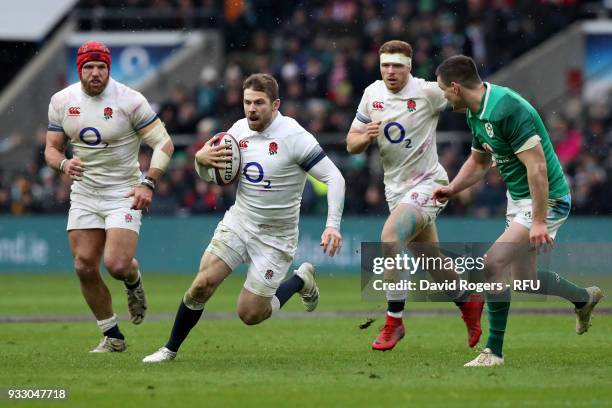 Richard Wigglesworth of England runs with the ball during the NatWest Six Nations match between England and Ireland at Twickenham Stadium on March...