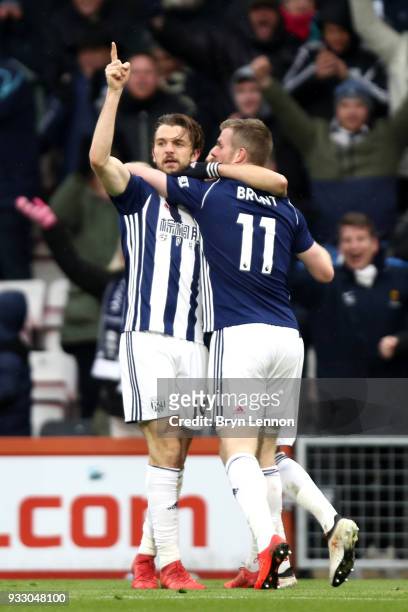 Jay Rodriguez of West Bromwich Albion celebrates scoring his side's first goal with Chris Brunt during the Premier League match between AFC...