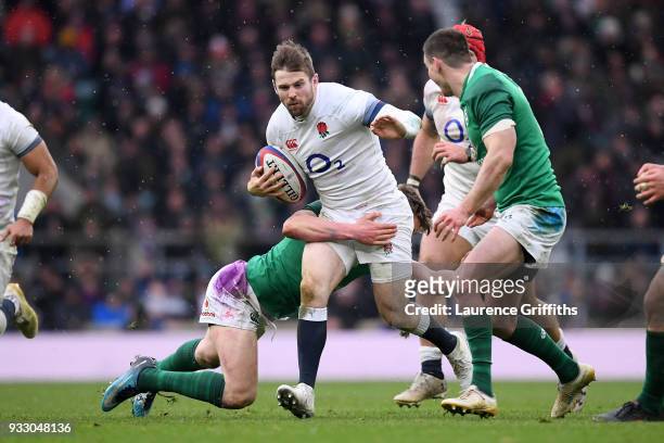 Richard Wigglesworth of England is tackled during the NatWest Six Nations match between England and Ireland at Twickenham Stadium on March 17, 2018...