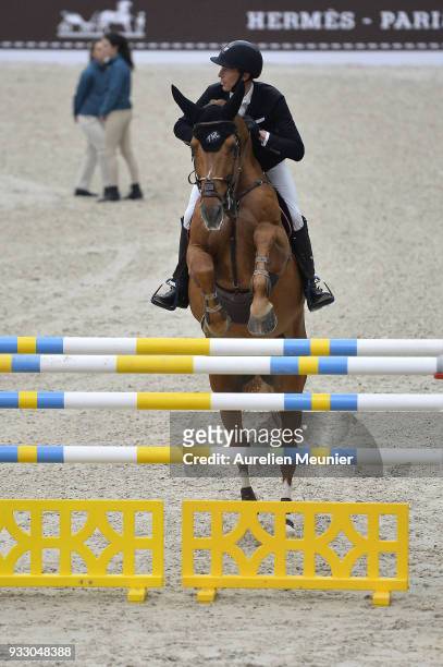 Kevin Staut of France on Silver Deux De Virton HDC competes during the Saut Hermes at Le Grand Palais on March 17, 2018 in Paris, France.