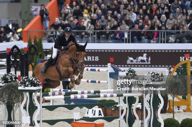 Kevin Staut of France on Silver Deux De Virton HDC competes during the Saut Hermes at Le Grand Palais on March 17, 2018 in Paris, France.