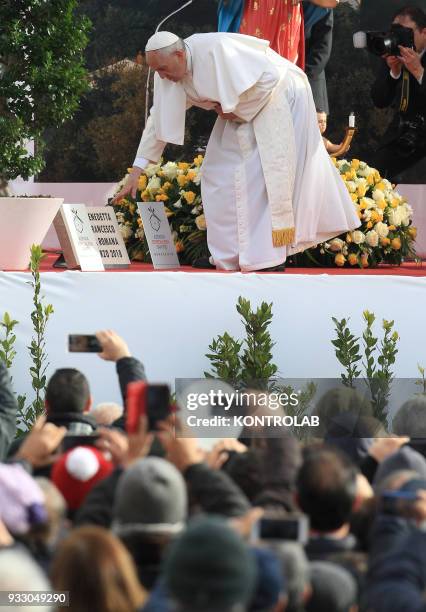 Pope Francis during his visit in the birthplace of Padre Pio, the famous Saint known for his miracles. Pope Francis waves to faithfuls during his...