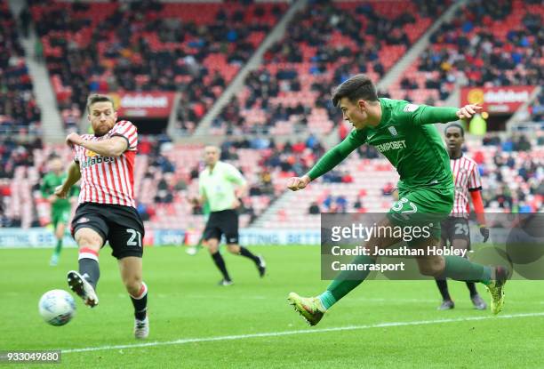 Preston's Josh Earl takes a shot at goal with Sunderland's Adam Matthews trying to block during the Sky Bet Championship match between Sunderland and...