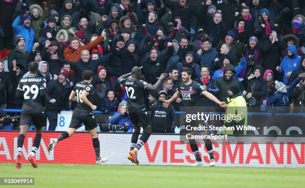 Crystal Palace's James Tomkins celebrates scoring the opening goal with team-mate Mamadou Sakho during the Premier League match between Huddersfield...