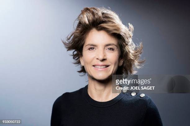 French journalist Anne Nivat poses during a photo session in Paris, on March 16, 2018.