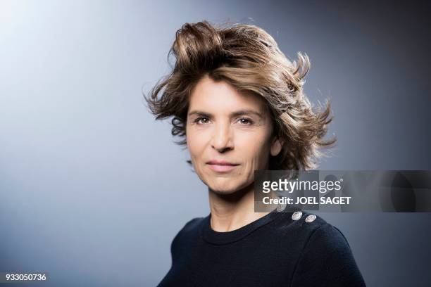 French journalist Anne Nivat poses during a photo session in Paris, on March 16, 2018.