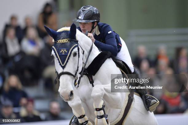 Louise Saywell of Great Britain on Ushuaia d Aurel competes during the Saut Hermes at Le Grand Palais on March 17, 2018 in Paris, France.