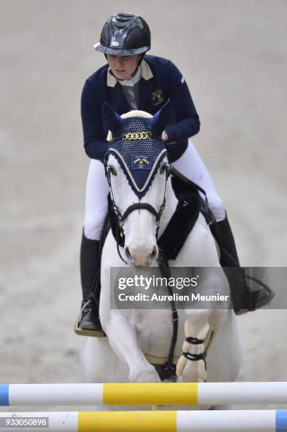 Louise Saywell of Great Britain on Ushuaia d Aurel competes during the Saut Hermes at Le Grand Palais on March 17, 2018 in Paris, France.