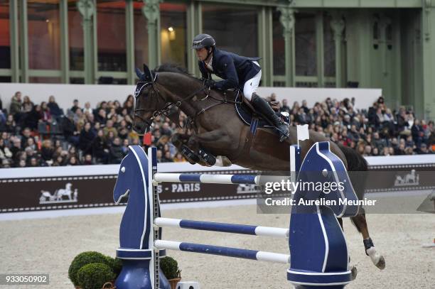 Julien Gonin of France on Well Done competes during the Saut Hermes at Le Grand Palais on March 17, 2018 in Paris, France.