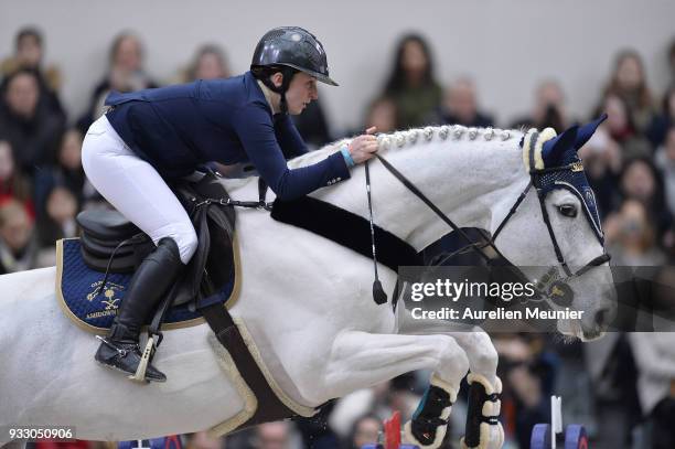 Louise Saywell of Great Britain on Ushuaia d Aurel competes during the Saut Hermes at Le Grand Palais on March 17, 2018 in Paris, France.