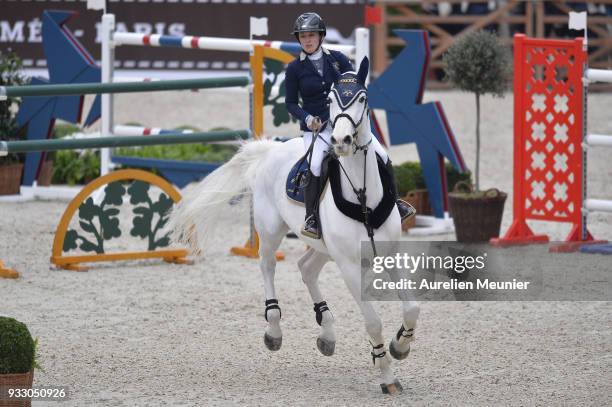 Louise Saywell of Great Britain on Ushuaia d Aurel competes during the Saut Hermes at Le Grand Palais on March 17, 2018 in Paris, France.