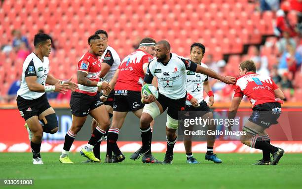 Albertus Kwagga Smith and Dylan Smith of Lions in action with Michael Leitch of Sunwolves during the Super Rugby match between Emirates Lions and...