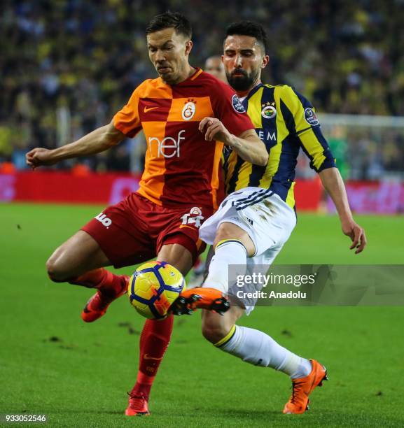 Hasan Ali Kaldirim of Fenerbahce in action against Martin Linnes of Galatasaray during a Turkish Super Lig week 26 soccer match between Fenerbahce...