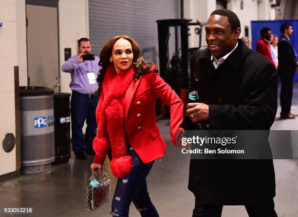 Head coach Avery Johnson of the Alabama Crimson Tide and wife Cassandra Johnson arrive for the game against the Villanova Wildcats in the second...