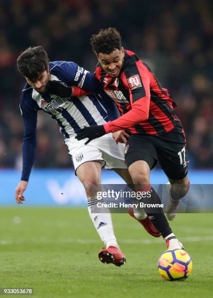 Claudio Yacob of West Bromwich Albion and Joshua King of AFC Bournemouth battle for the ball during the Premier League match between AFC Bournemouth...