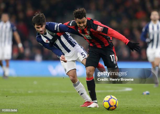 Claudio Yacob of West Bromwich Albion and Joshua King of AFC Bournemouth battle for the ball during the Premier League match between AFC Bournemouth...