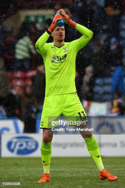 Wayne Hennessey of Crystal Palace shows appreciation to the fans following the Premier League match between Huddersfield Town and Crystal Palace at...
