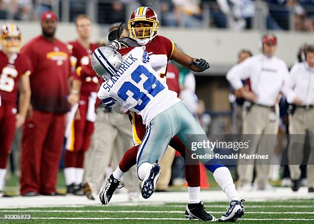 Wide receiver Antwaan Randle El of the Washington Redskins is tackled by Orlando Scandrick of the Dallas Cowboys at Cowboys Stadium on November 22,...