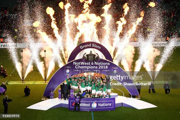 The Ireland team celebrate with the NatWest Six Nations trophy and the Triple Crown Trophy after the NatWest Six Nations match between England and...