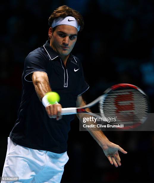 Roger Federer of Switzerland returns the ball during the men's singles first round match against Fernando Verdasco of Spain during the Barclays ATP...