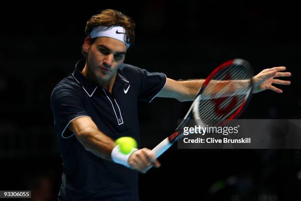 Roger Federer of Switzerland returns the ball during the men's singles first round match against Fernando Verdasco of Spain during the Barclays ATP...