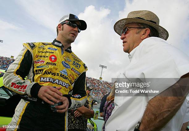 Paul Menard , driver of the Johns Manville/Menards Ford, talks with team owner Jack Roush on the grid prior to the start of the NASCAR Sprint Cup...