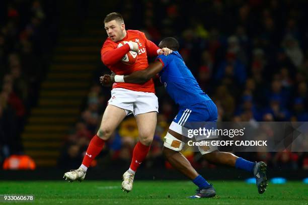 Wales' prop Rob Evans is tackled by France's flanker Yacouba Camara during the Six Nations international rugby union match between Wales and France...