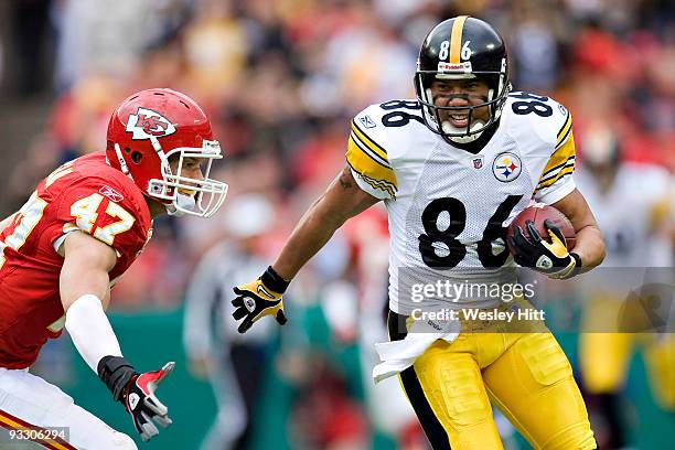 Wide receiver Hines Ward of the Pittsburgh Steelers runs with the ball after making a catch against the Kansas City Chiefs at Arrowhead Stadium on...