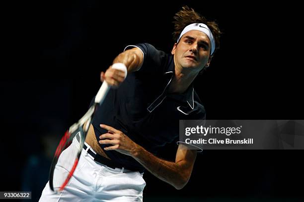 Roger Federer of Switzerland serves the ball during the men's singles first round match against Fernando Verdasco of Spain during the Barclays ATP...