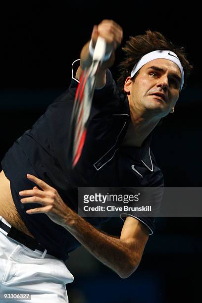 Roger Federer of Switzerland serves the ball during the men's singles first round match against Fernando Verdasco of Spain during the Barclays ATP...
