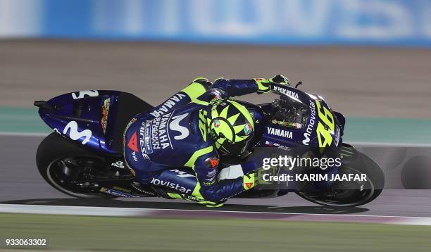 Movistar Yamaha's Italian driver Valentino Rossi competes during the MOTO GP qualifiers at the Losail International Circuit in Doha on March 17,...