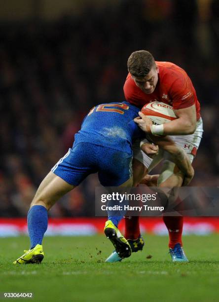 Geoffrey Doumayrou of France tackles Scott Williams of Wales during the NatWest Six Nations match between Wales and France at Principality Stadium on...