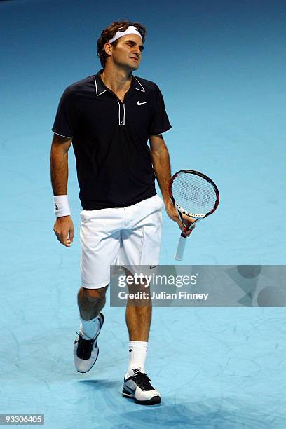 Roger Federer of Switzerland reacts during the men's singles first round match against Fernando Verdasco of Spain during the Barclays ATP World Tour...