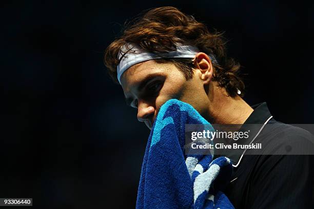 Roger Federer of Switzerland reacts during the men's singles first round match against Fernando Verdasco of Spain during the Barclays ATP World Tour...