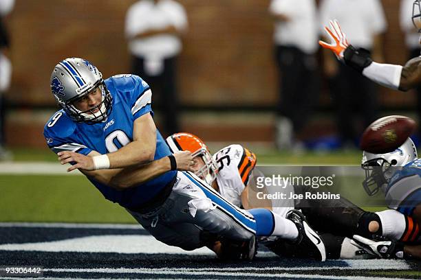 Matthew Stafford of the Detroit Lions tries to pass the football before being sacked in the end zone against Jason Trusnik the Cleveland Browns at...