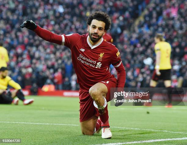 Mphamed Salah of Liverpool Celebrates the opening goal during the Premier League match between Liverpool and Watford at Anfield on March 17, 2018 in...