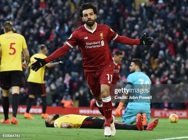 Mphamed Salah of Liverpool Celebrates the opening goal during the Premier League match between Liverpool and Watford at Anfield on March 17, 2018 in...