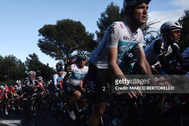 Lukasz Wisniowski of team Sky, Salvatore Puccio of team Sky and Tom Dumoulin of team Sunweb ride in the pack during the 109th edition of the Milan -...