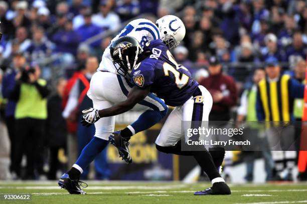 Ed Reed of the Baltimore Ravens stops Reggie Wayne of the Indianapolis Colts at M&T Bank Stadium on November 22, 2009 in Baltimore, Maryland. The...