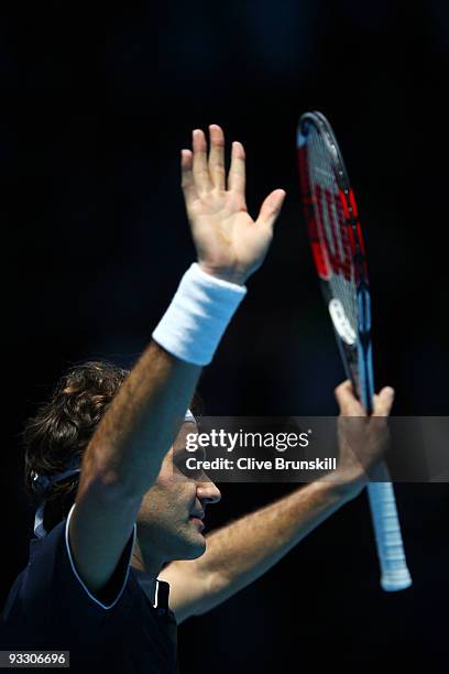 Roger Federer of Switzerland celebrates the match during the men's singles first round match against Fernando Verdasco of Spain during the Barclays...