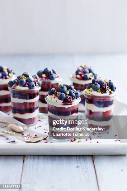 red velvet and blueberry cake cups - red pistachio nuts stock pictures, royalty-free photos & images