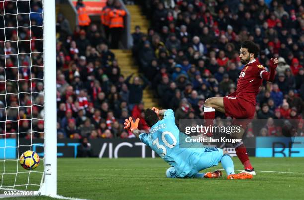 Mohamed Salah of Liverpool scores his side's second goal during the Premier League match between Liverpool and Watford at Anfield on March 17, 2018...