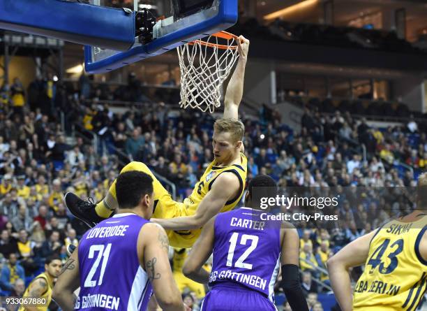 Jordan Loveridge of BG Goettingen, Niels Giffey of Alba Berlin and Darius Carter of BG Goettingen during the Basketball Bundesliga game between Alba...