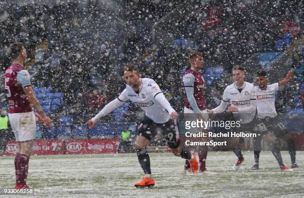 Bolton Wanderers Adam Le Fondre scores his side's first goal during the Sky Bet Championship match between Bolton Wanderers and Aston Villa at Macron...