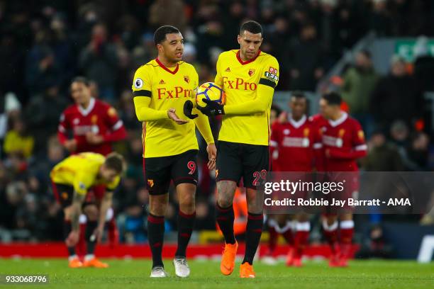 Troy Deeney of Watford and Etienne Capoue of Watford dejected after conceding the second goal during the Premier League match between Liverpool and...