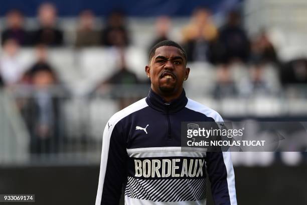 Bordeaux's Brazilian forward Malcom reacts during the warm up prior to the French L1 football match between Bordeaux and Rennes on March 17 at the...