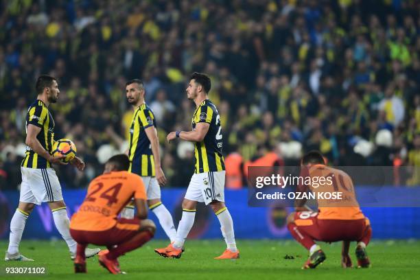 Fenerbahce and Galatasaray's players reacts after a draw end of Turkish Spor Toto Super league fotball match between Fenerbahce and Galatasaray on...