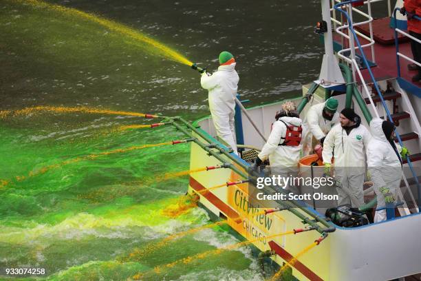 Members of the local plumber's union dye the Chicago River green in celebration of St. Patrick's Day on March 17, 2018 in Chicago, Illinois. Dyeing...